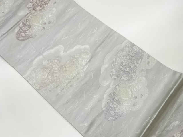 雲取りに花唐草・菱・松葉・鳥模様織出し袋帯